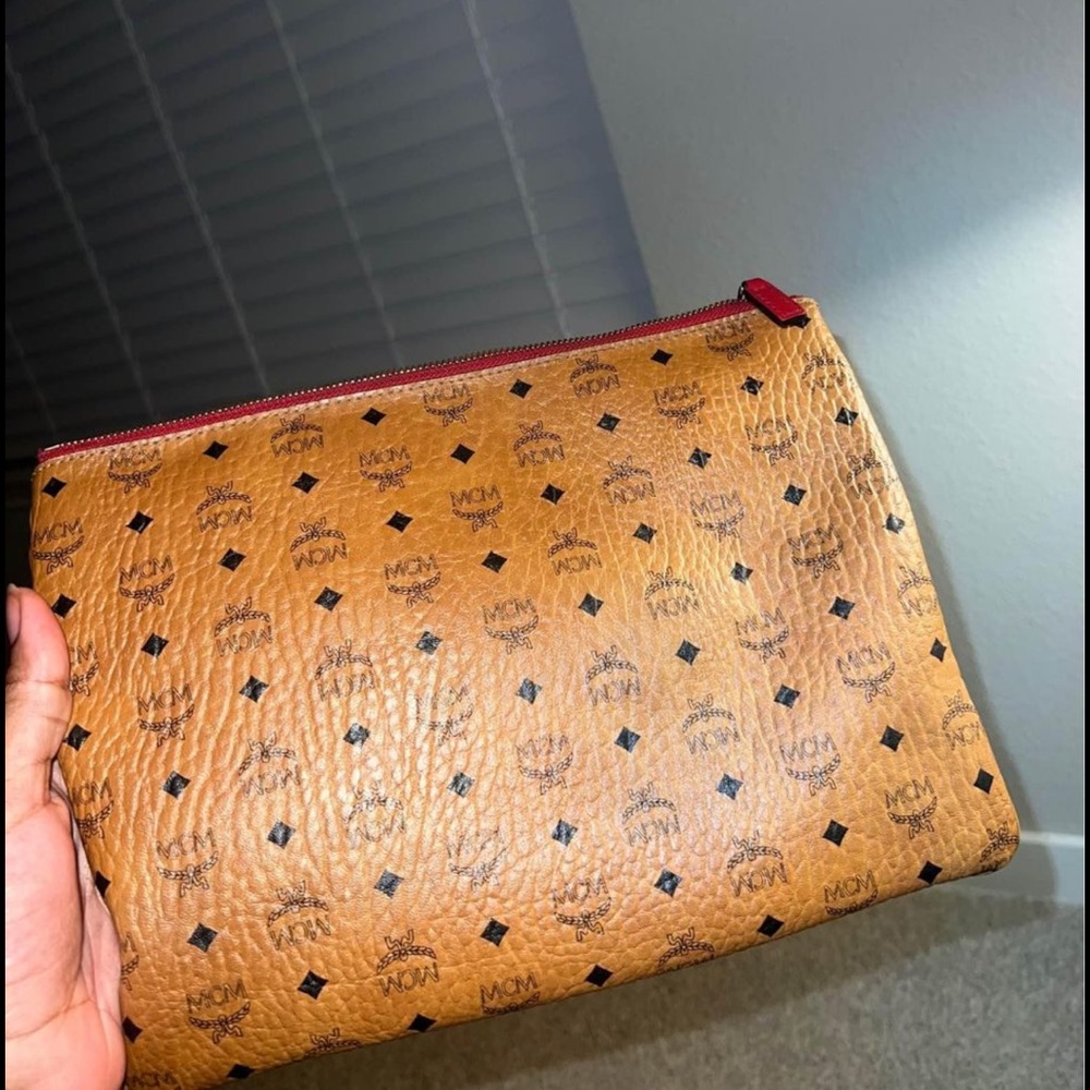 MCM Clutch bag. 7/10 condition, cognac color, medium size